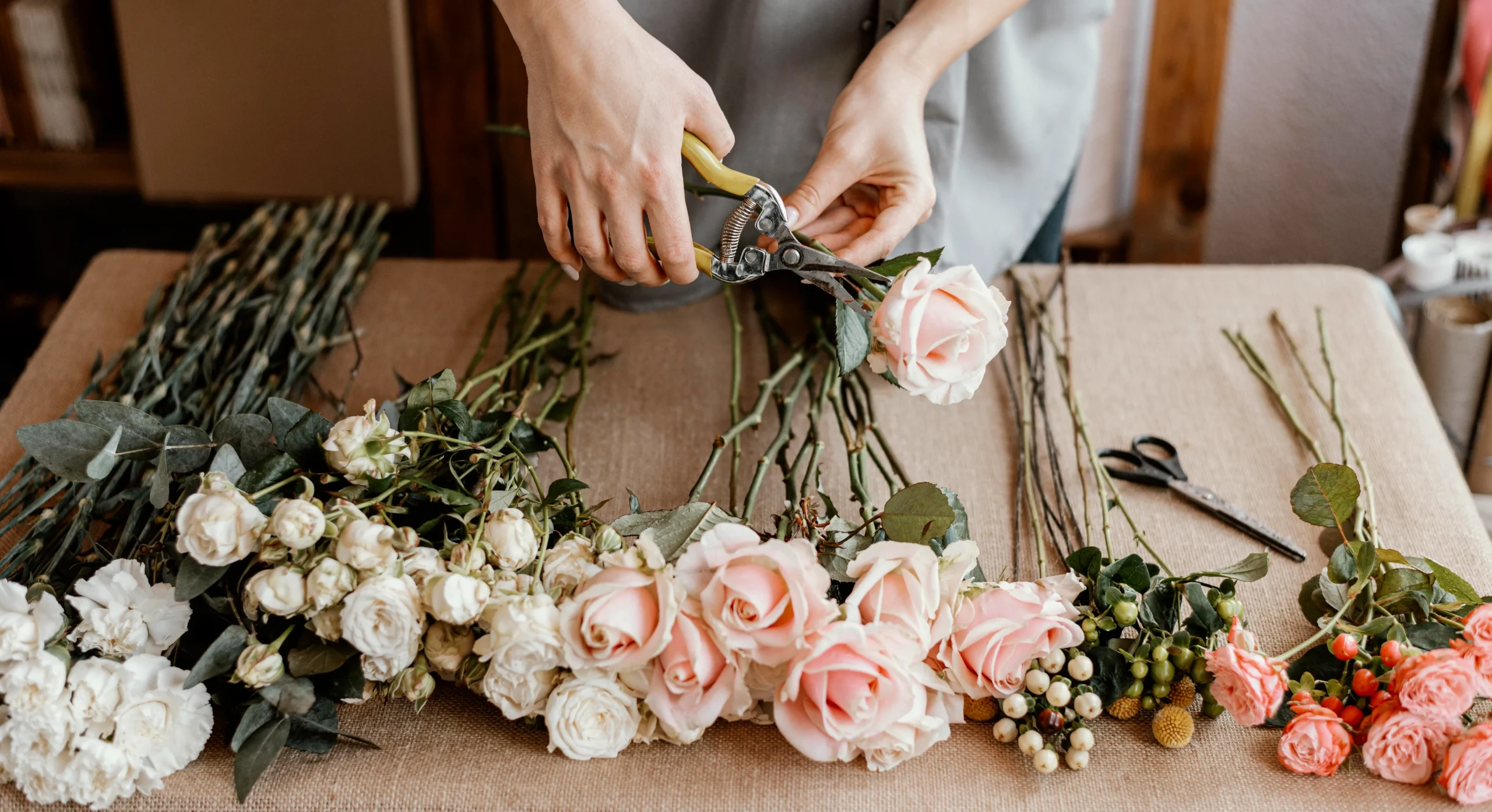 Florist preparing fresh flowers