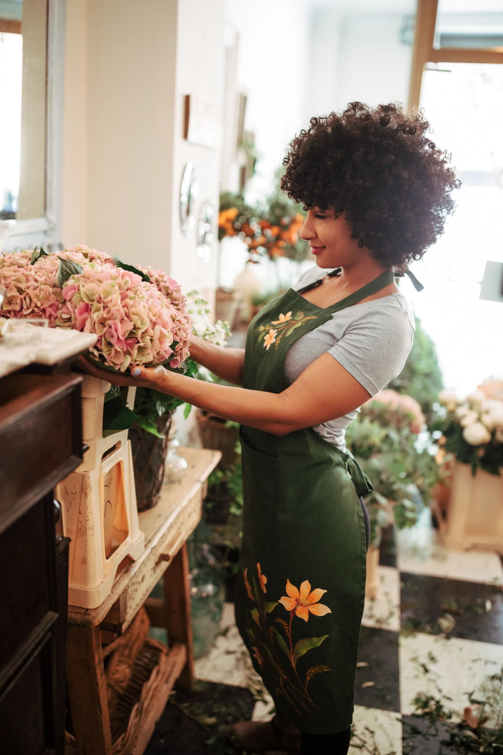 Florist arranging flowers in a flower shop
