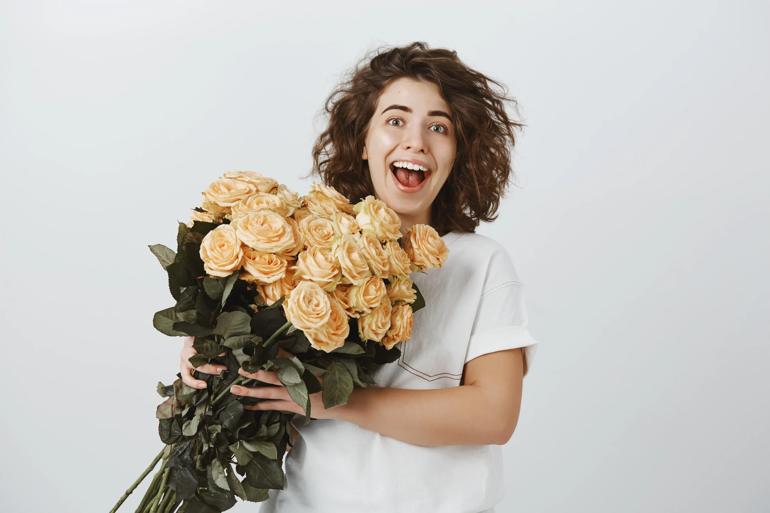 Woman receiving a bouquet of flowers