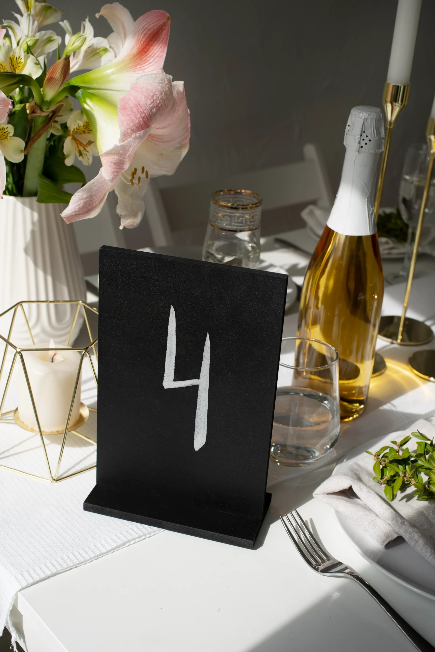 Wedding table arrangement with flowers for a Perth reception